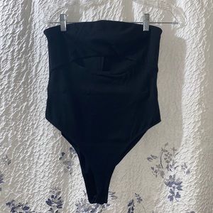 One piece with open space under boobs